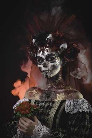 Young girl in the image of Santa Muerte